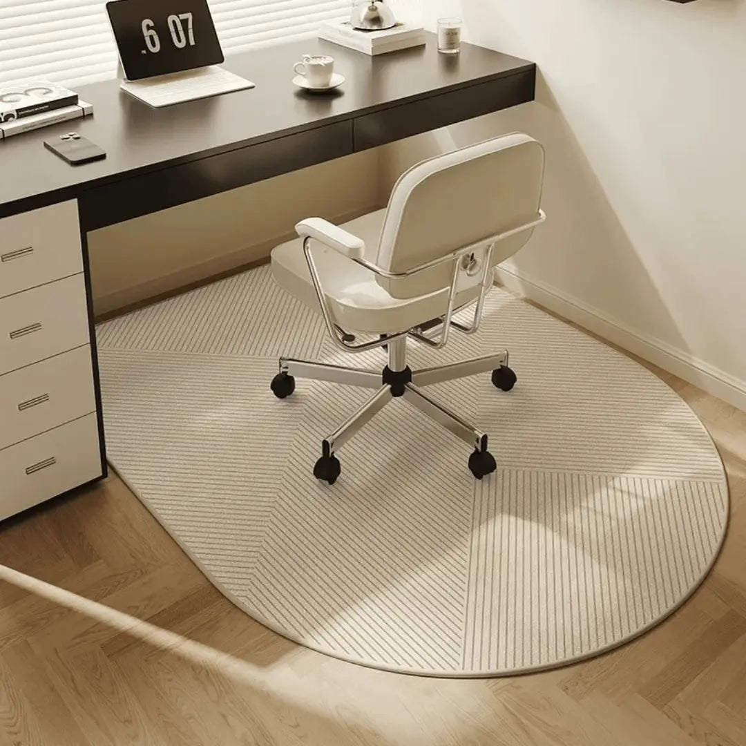 Clear non-slip office chair mat protecting hardwood floors from scratches, ideal for desk chairs in home offices.