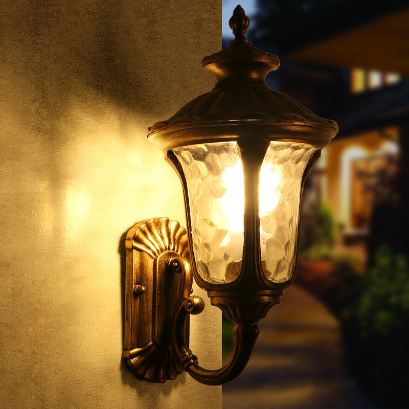 Stylish black waterproof wall light with glass for patio and home exterior.