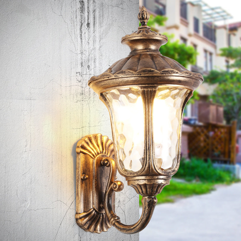 Exterior wall light sconce, durable black finish, perfect for outdoor home decor.