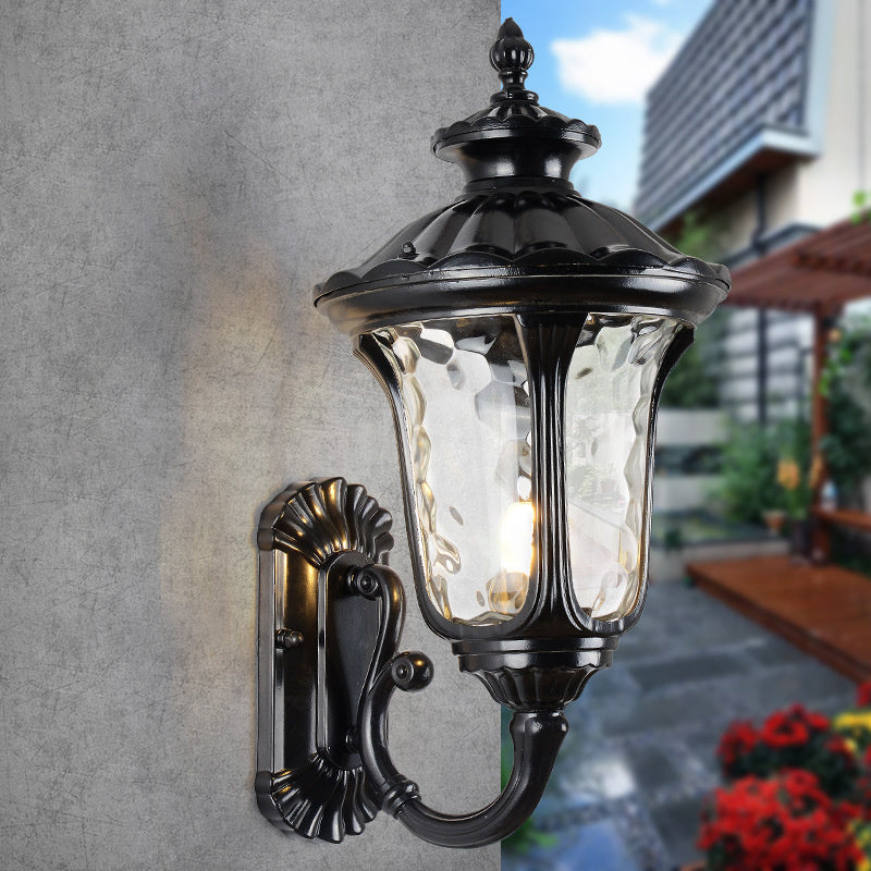 Outdoor porch light, waterproof and durable, featuring a clear glass shade.