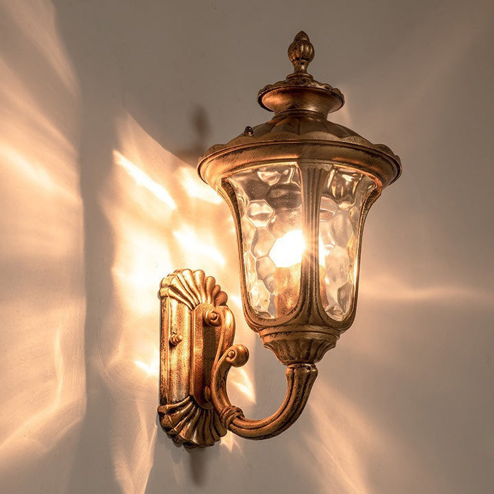 Bronze finish exterior wall light for home, waterproof with a beautiful glass shade.