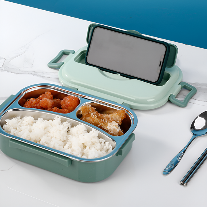 Stainless steel thermal lunch box with multiple compartments for organized meals.