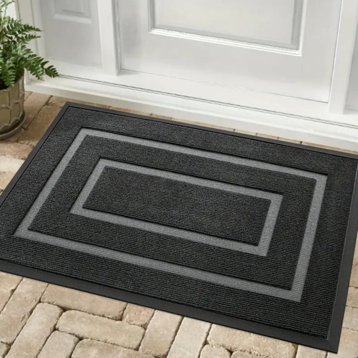 Durable, water-resistant rubber door mat for home. All-season entryway mat with anti-slip feature & classic print.