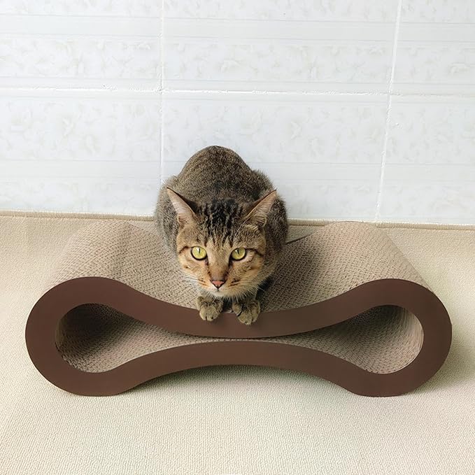 Comfortable infinity cardboard cat bed, perfect for scratching & napping. Eco-friendly feline lounge for happy cats.