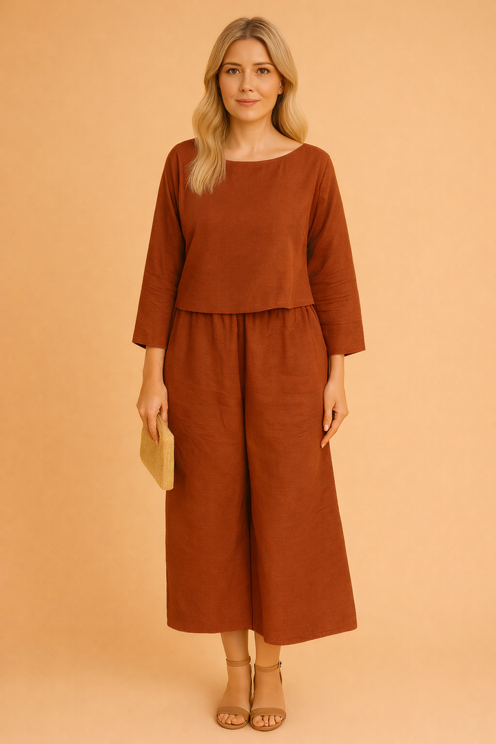 Effortless Chic women's blouse & trousers set. Elegant two-piece outfit for versatile casual or dressy wear.
