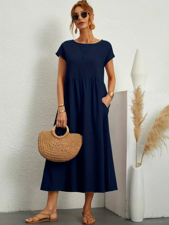 Occasion wear women's midi dress, elegant and flowy, designed for effortless comfort.