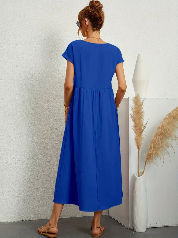 Women's casual flowy elegant midi dress, comfortable for everyday wear, yet stylish for occasions.