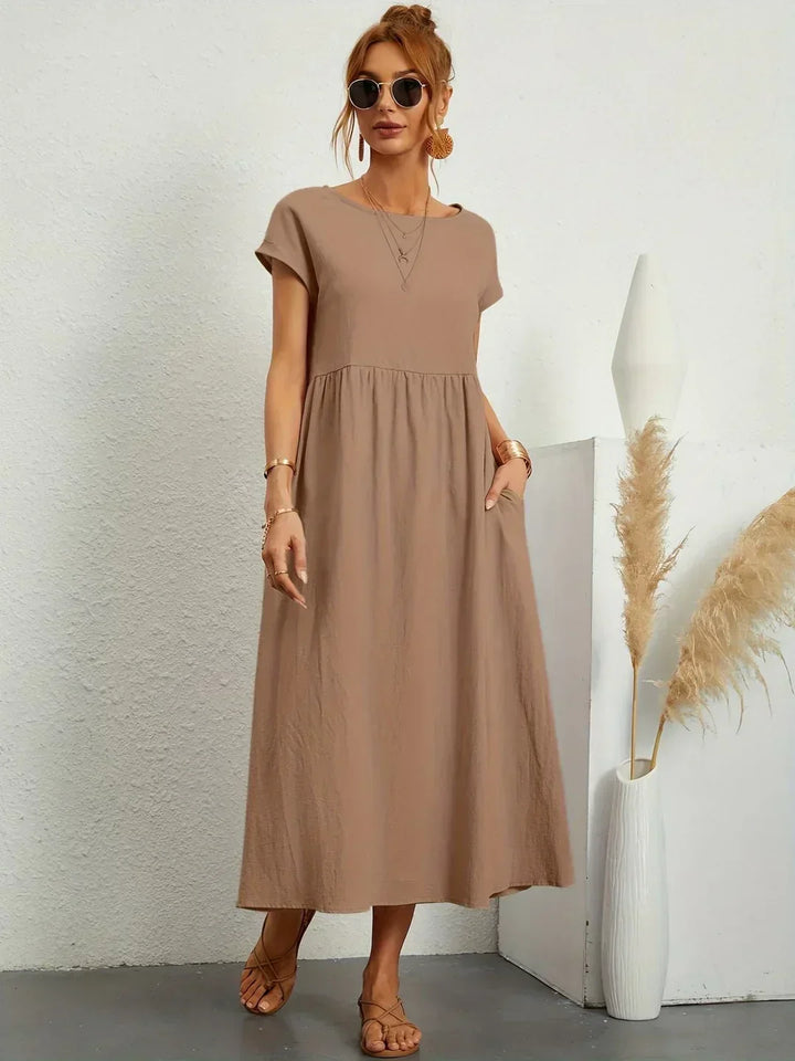 Effortless women's midi dress, a flowy elegant design, comfortable for any timeless occasion.