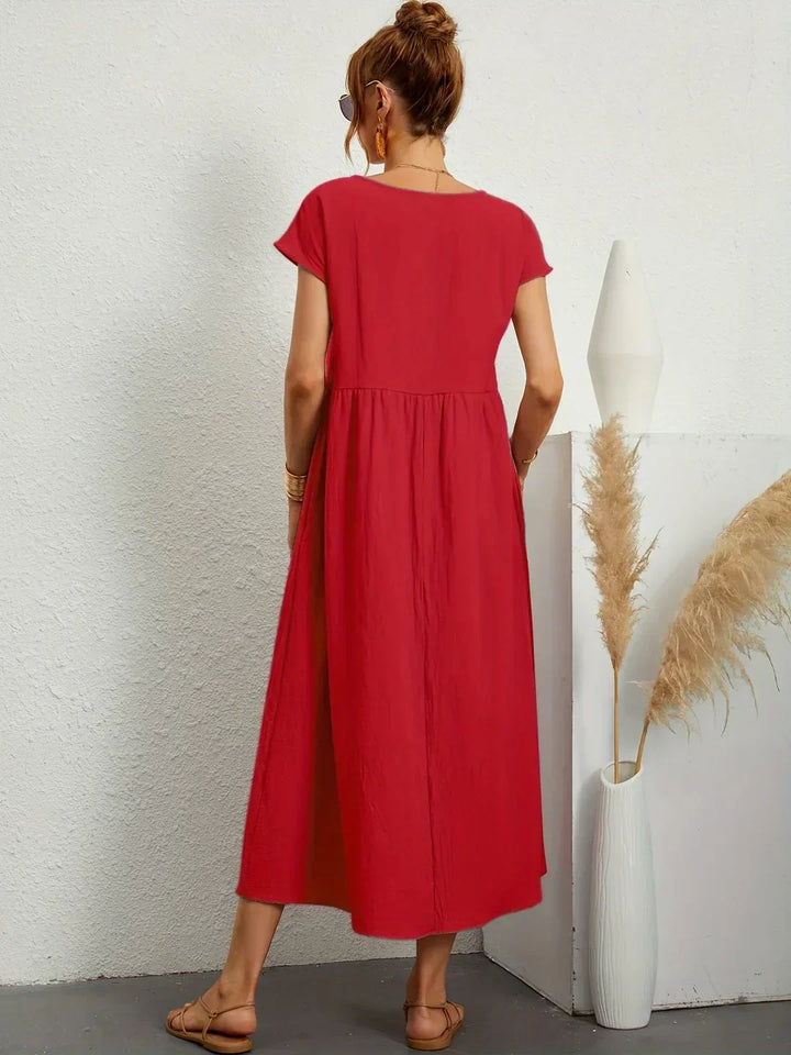 Women's summer casual elegant midi dress, flowy design for comfortable and versatile styling.