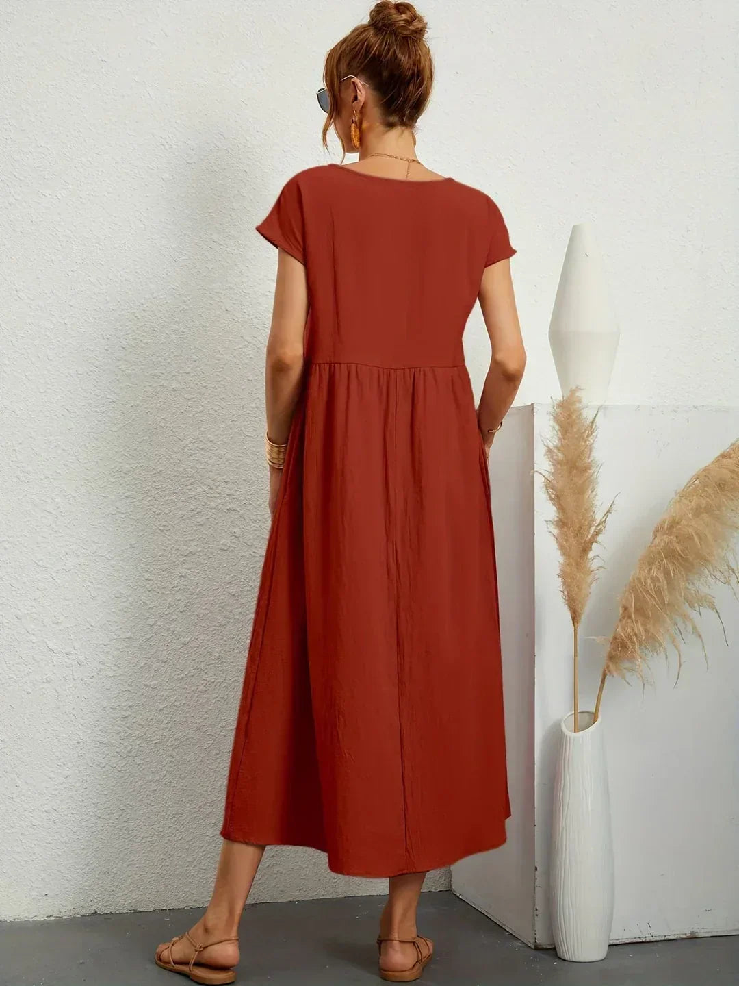 Effortless flowy elegant midi dress for women, offering comfortable and timeless style for any occasion.
