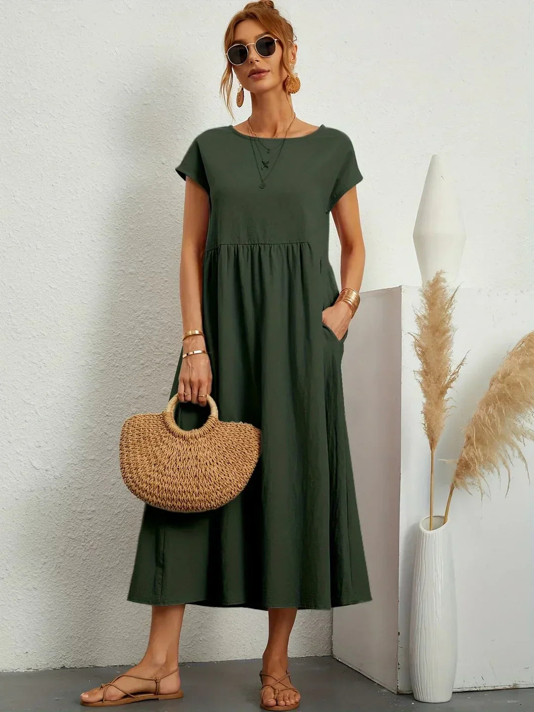 Versatile elegant midi dress for women, featuring a comfortable and flowy silhouette.