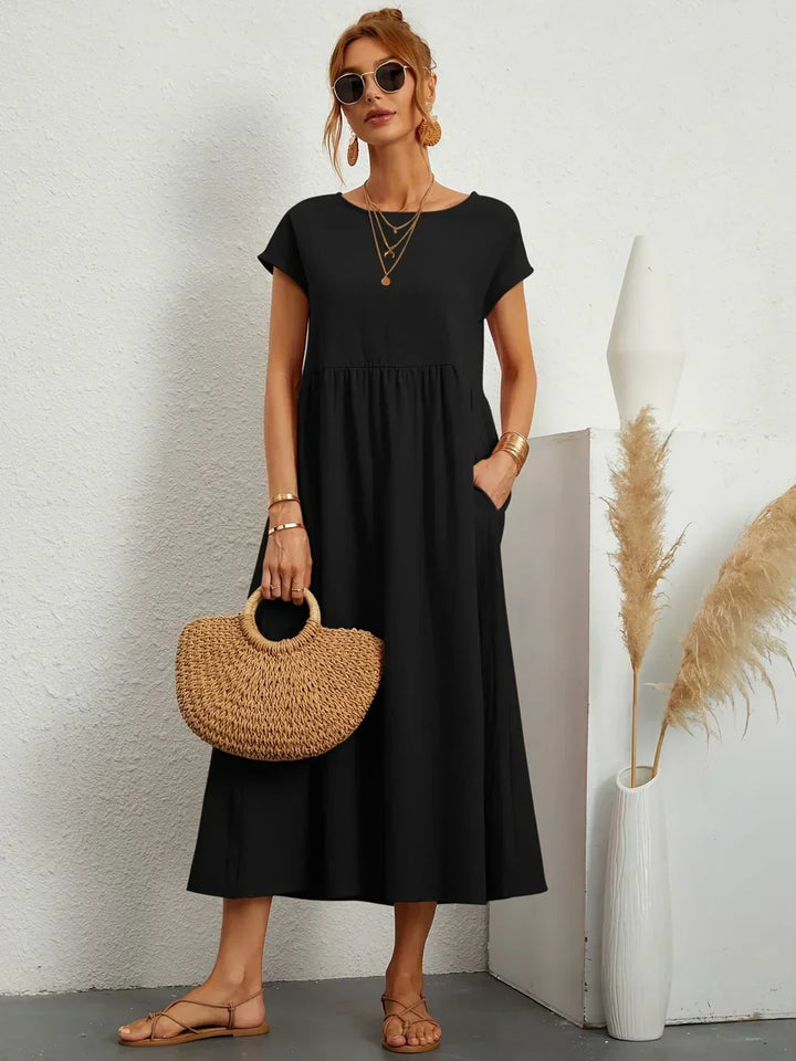 Flowy summer midi dress for women, an effortless and elegant choice for daily wear or events.