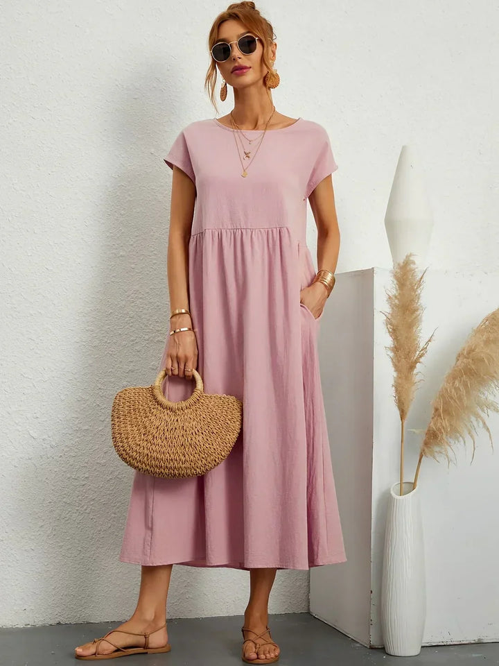 Versatile midi dress for women, flowy and elegant, ideal for summer or casual outings.