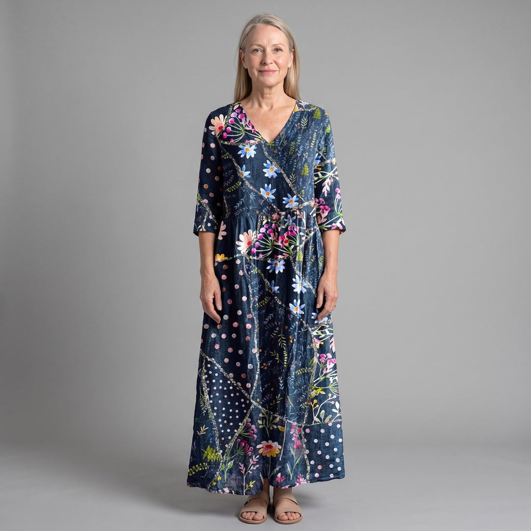 Effortless navy floral summer dress for women, flowy and comfortable for casual wear or vacation.