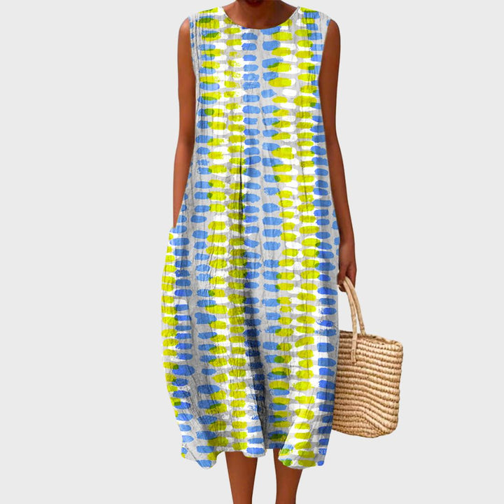 Elegant knee-length flowy dress for women. Comfortable & versatile, perfect for casual or dressed-up occasions.