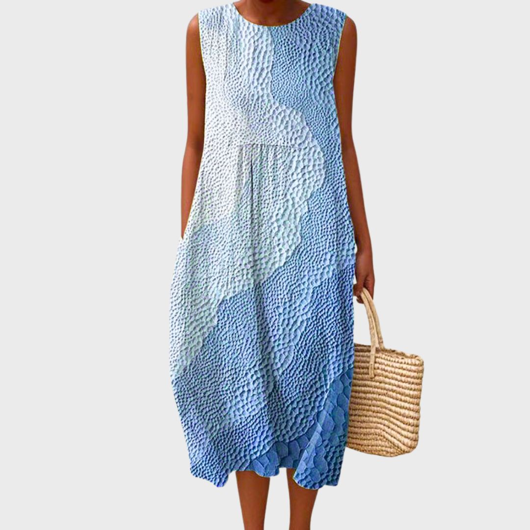 Soft, comfortable women's midi dress with a flowy silhouette. Effortless style for versatile, everyday fashion.