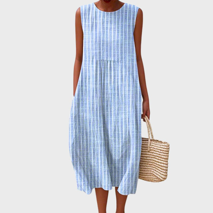 Comfortable women's midi dress. Flowy, elegant, & versatile for everyday wear. Effortless women's fashion.
