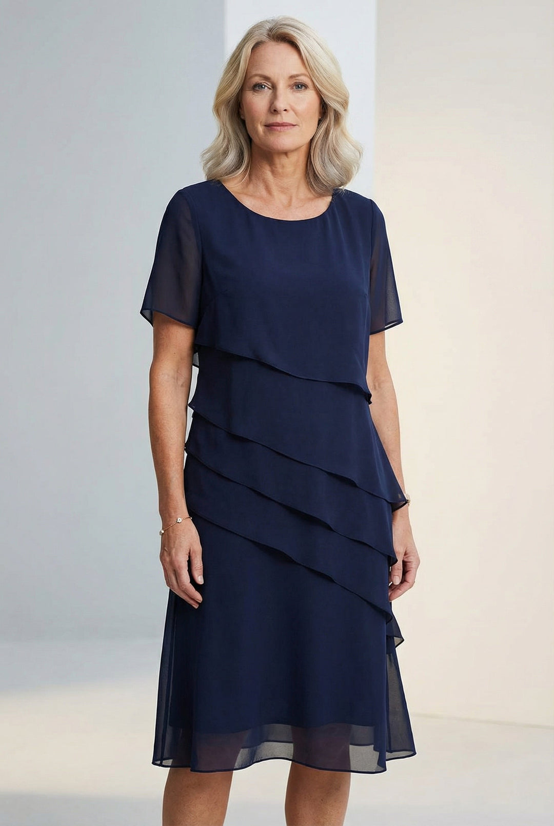 Elarisse ruffle midi dress in elegant navy blue, perfect for day to night.