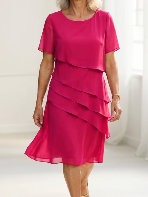Elarisse timeless midi dress with cascading ruffles, exuding feminine charm and comfort.