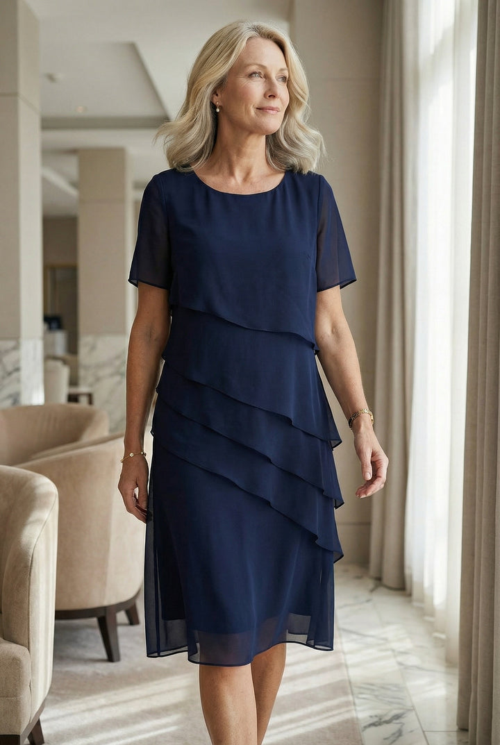 Chic Elarisse ruffle midi dress, ideal for any occasion, blending elegance and comfort.