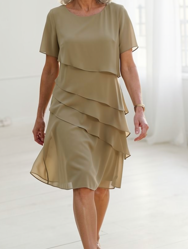 The Elarisse comfortable midi dress, a versatile choice for effortless style.