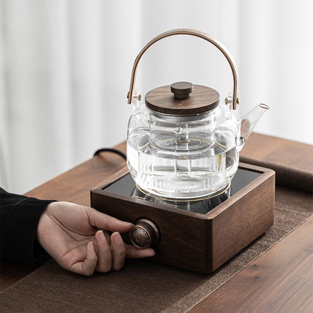 Walnut electric tea warmer, adjustable temp, keeps your tea kettle hot for extended enjoyment.