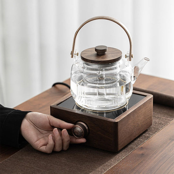 Walnut electric tea warmer, adjustable temp, keeps your tea kettle hot for extended enjoyment.