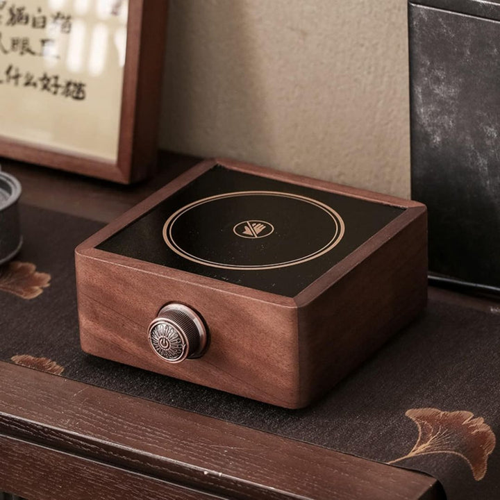 Rich walnut finish on electric tea warmer with precise adjustable temperature control for drinks.