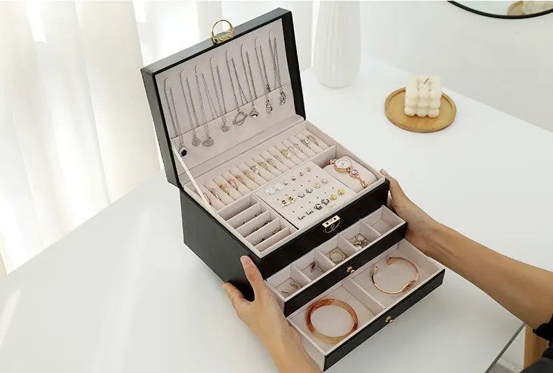 Desktop vanity jewelry box, 3-layer design for optimal organization of rings, watches, and bracelets.