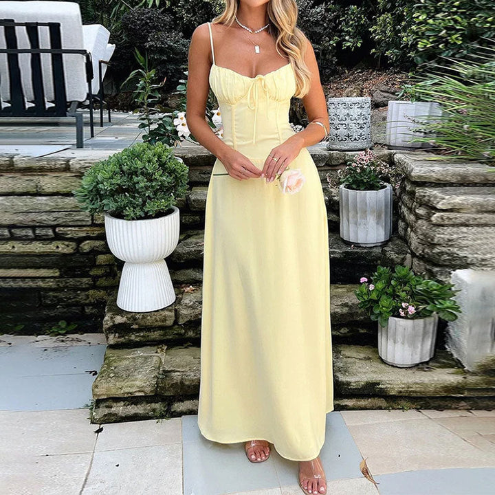 Elegant A-line maxi dress for women with tie front & spaghetti straps. Perfect for summer parties & occasion wear.