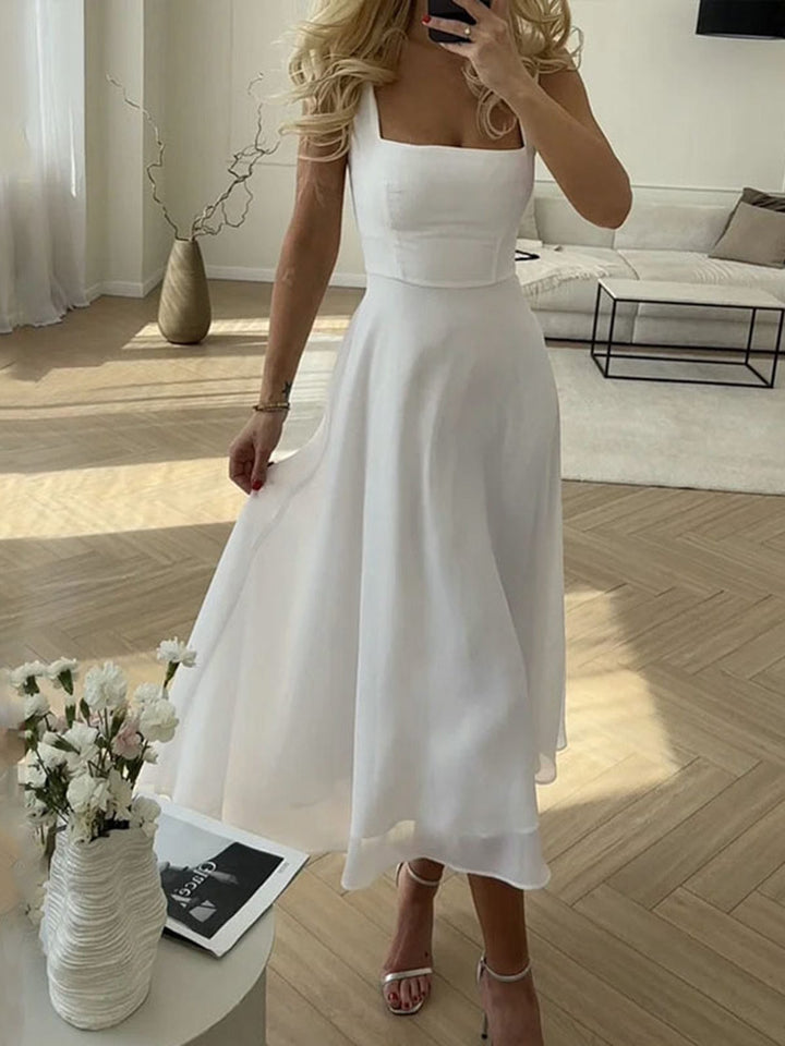 Elegant A-line midi dress for women, featuring a sophisticated square neck, perfect for wedding guests.