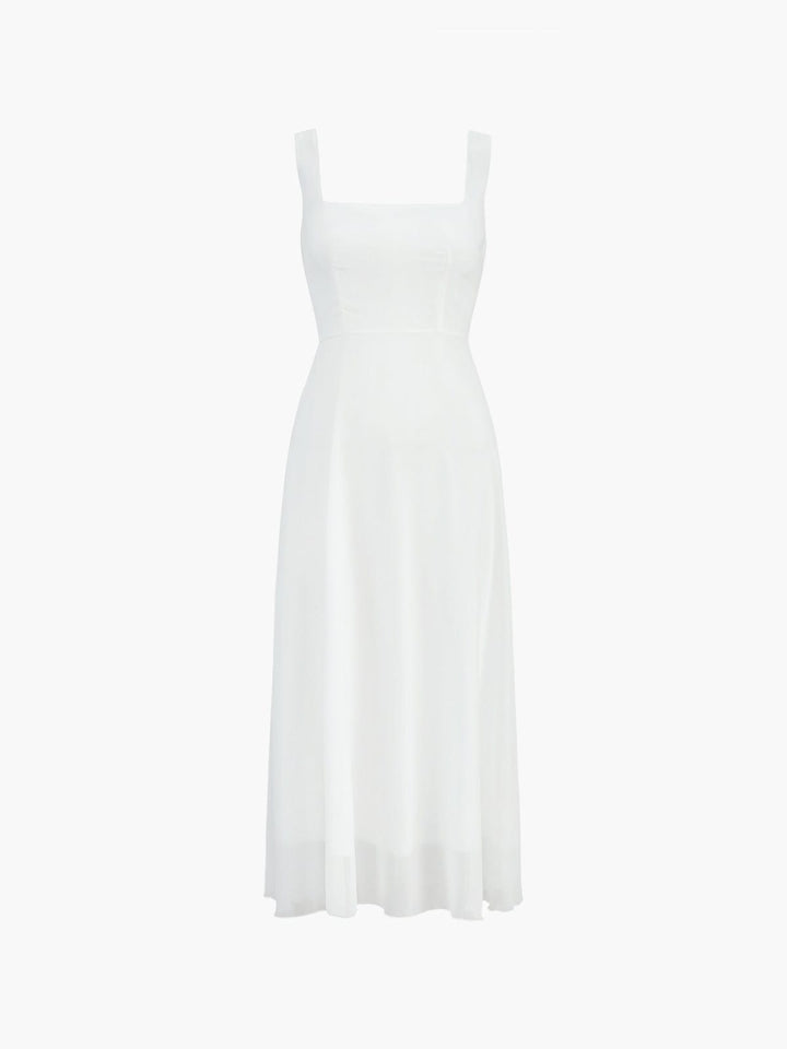 Sophisticated women's midi dress, A-line cut with square neck. Comfortable for elegant wedding guest events.