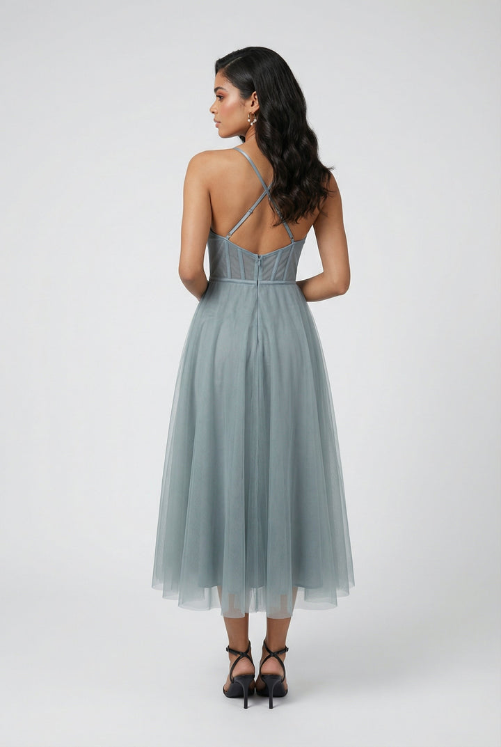 Comfortable sleeveless A-line midi dress in a stylish blue hue, ideal for casual outings.