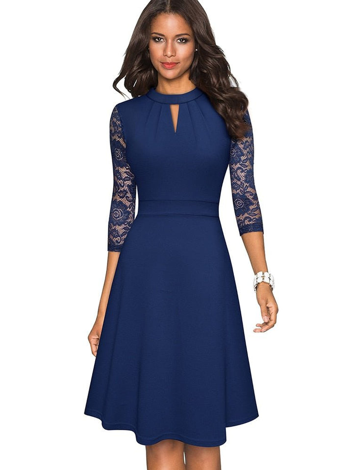 Stunning women's evening A-line dress, midi length, with intricate 3/4 sleeves, ideal for special occasions.