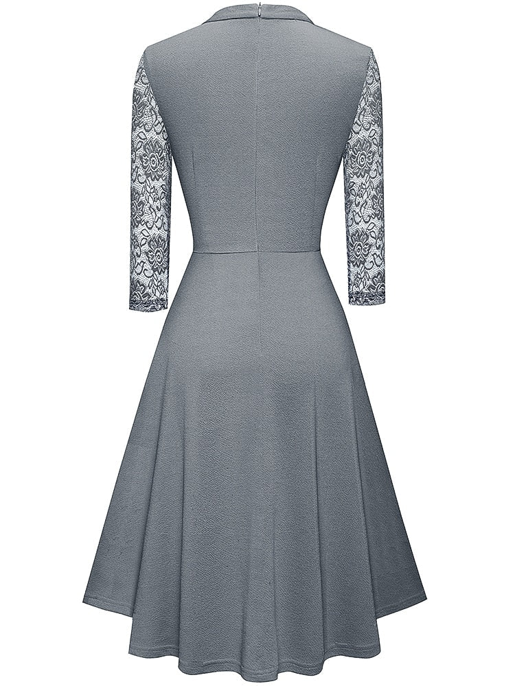 Elegant women's party A-line midi dress with intricate 3/4 sleeves. Perfect for special evening occasions.