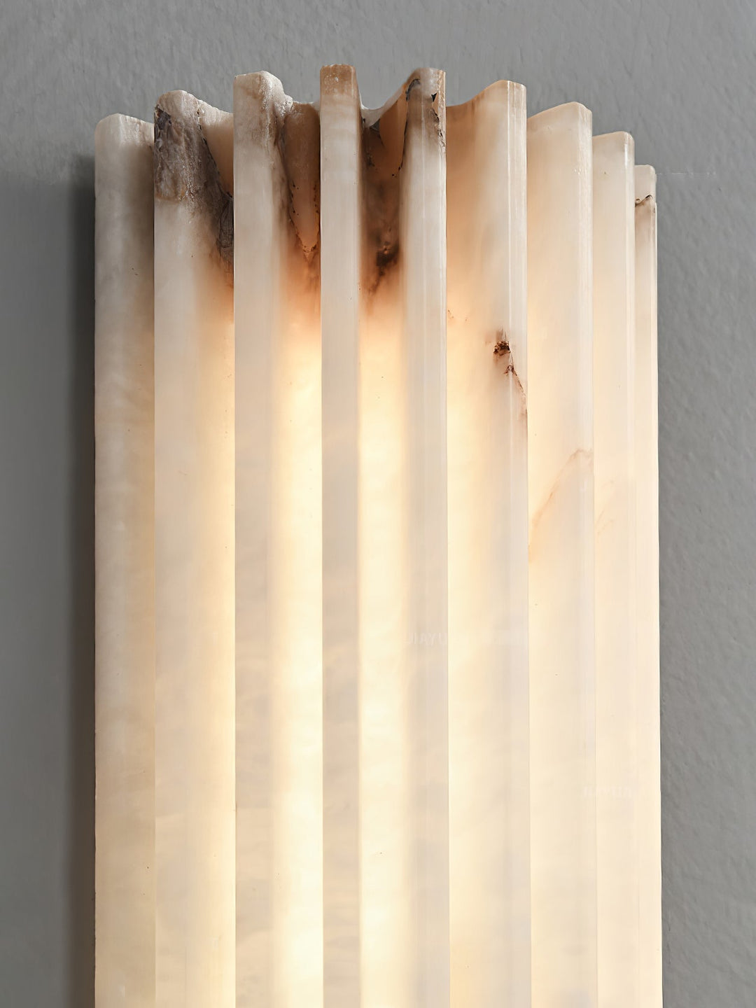 Natural stone beauty in an alabaster LED wall light, enhancing modern interior decor.