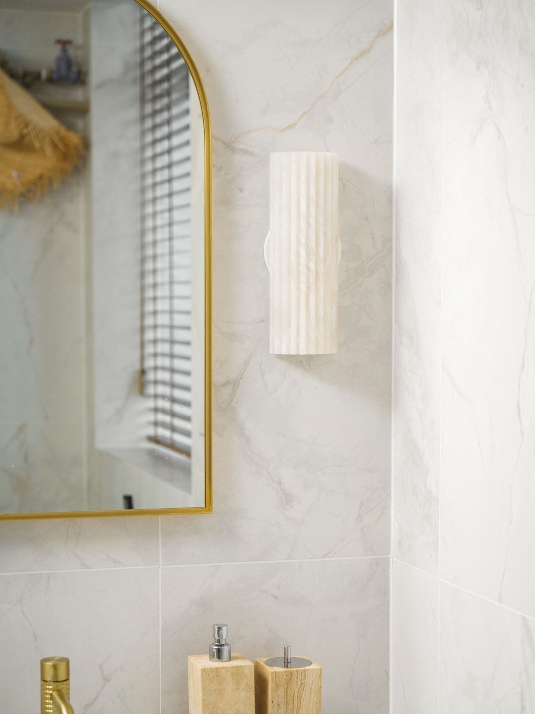 Sophisticated alabaster LED wall light, elegant natural stone modern lamp for upscale homes.