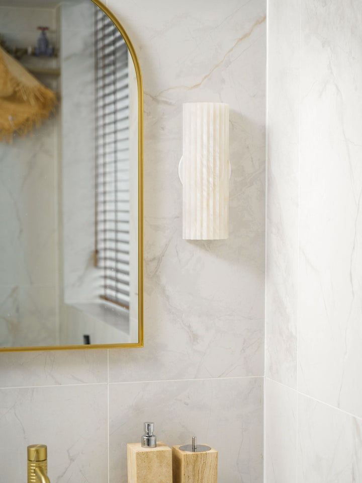 Sophisticated alabaster LED wall light, elegant natural stone modern lamp for upscale homes.