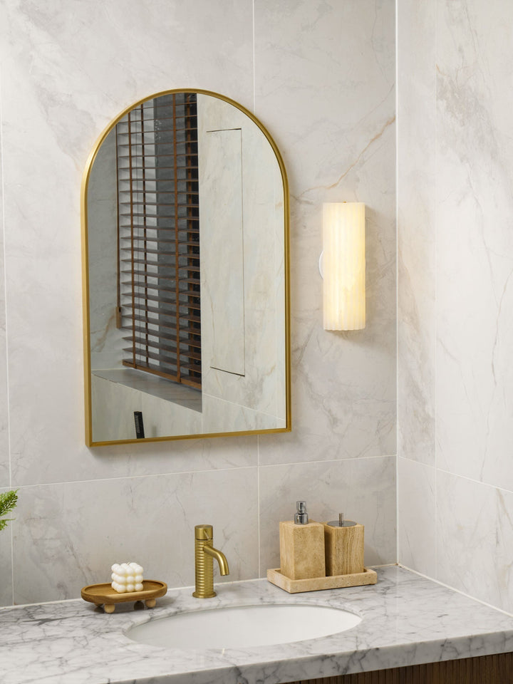 Dimmable alabaster LED wall light, natural stone decor for contemporary living spaces.