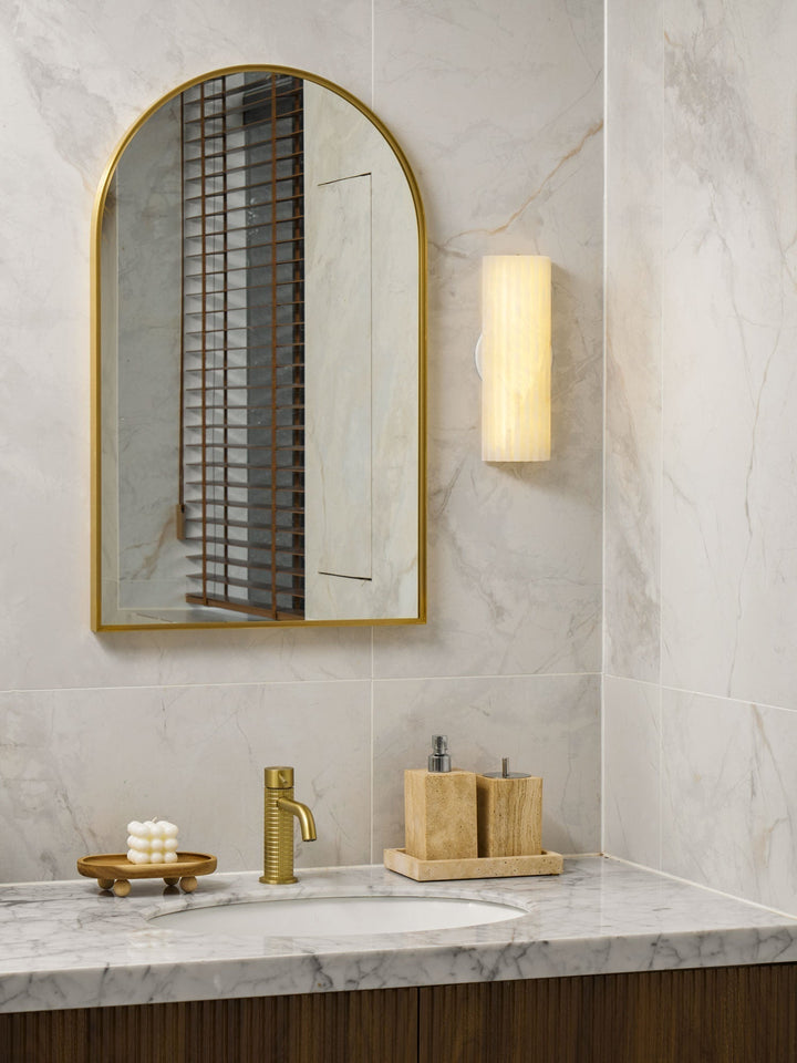 Natural stone alabaster wall light, LED modern lighting for luxury architectural appeal.