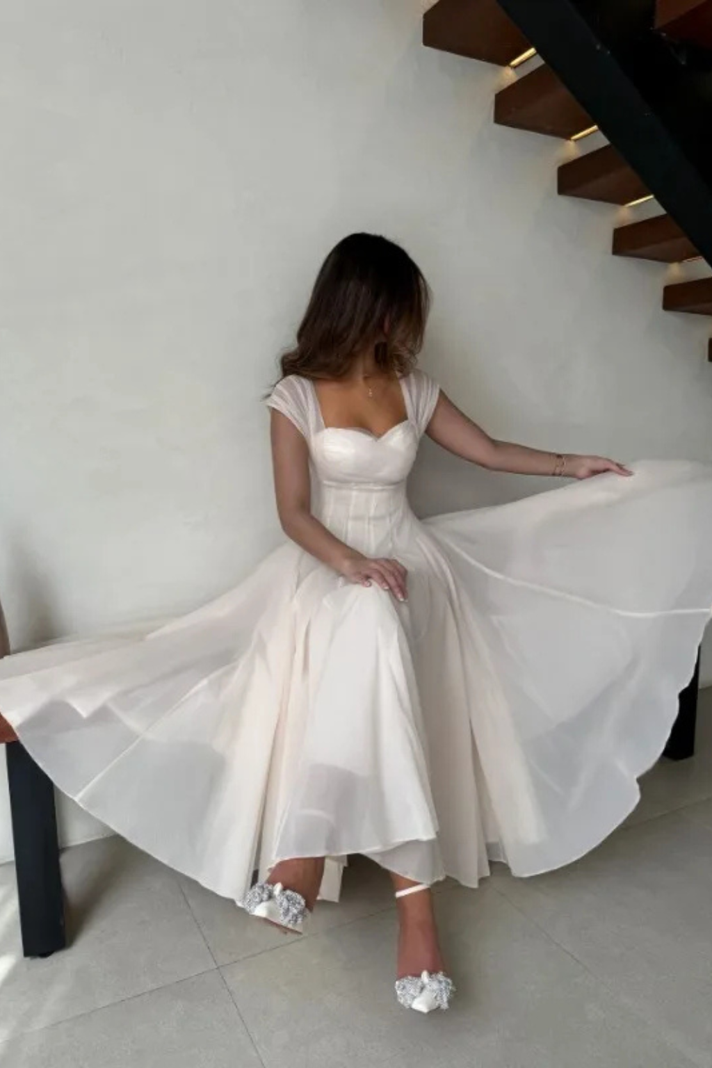 Women's A-line midi wedding guest dress featuring a sweetheart neckline & stylish cap sleeves. Semi-formal elegance.