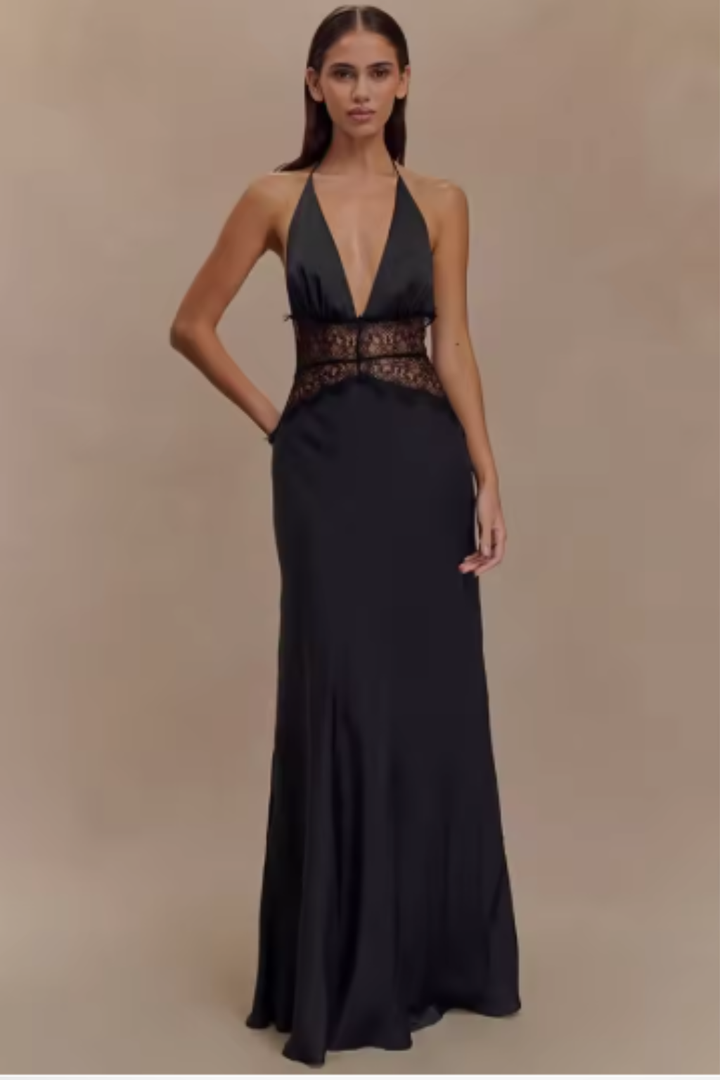 Women's formal halter neck backless maxi dress in a flowing, elegant design for special occasions.