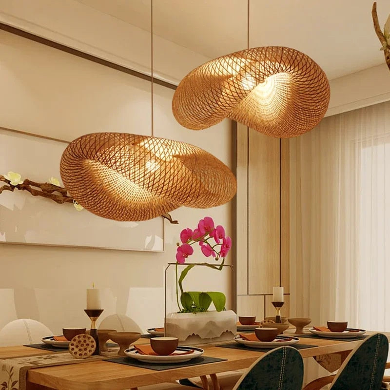 Decorative wicker style bamboo light, featuring a delicate rattan shade, perfect as a statement ceiling lamp.