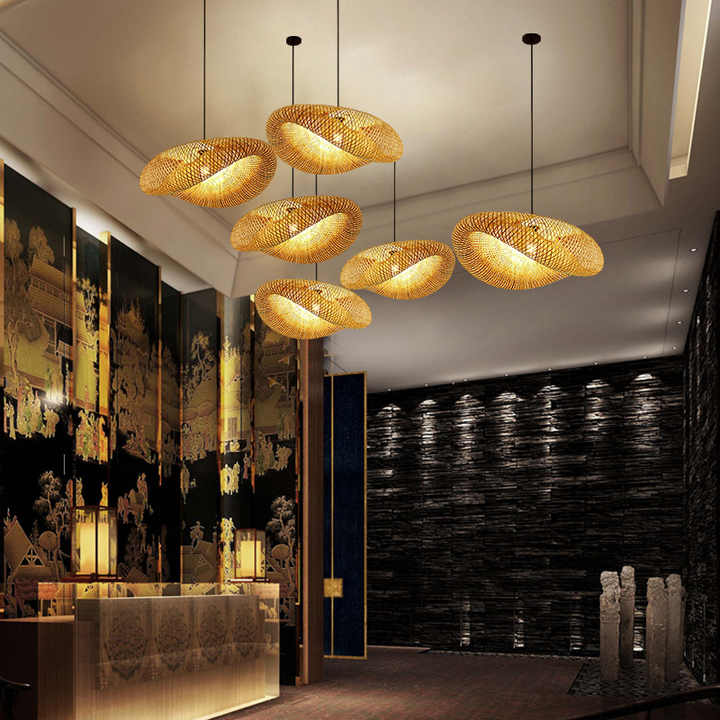 Natural decor pendant light featuring a woven rattan shade & sturdy bamboo frame, eco-friendly lighting.