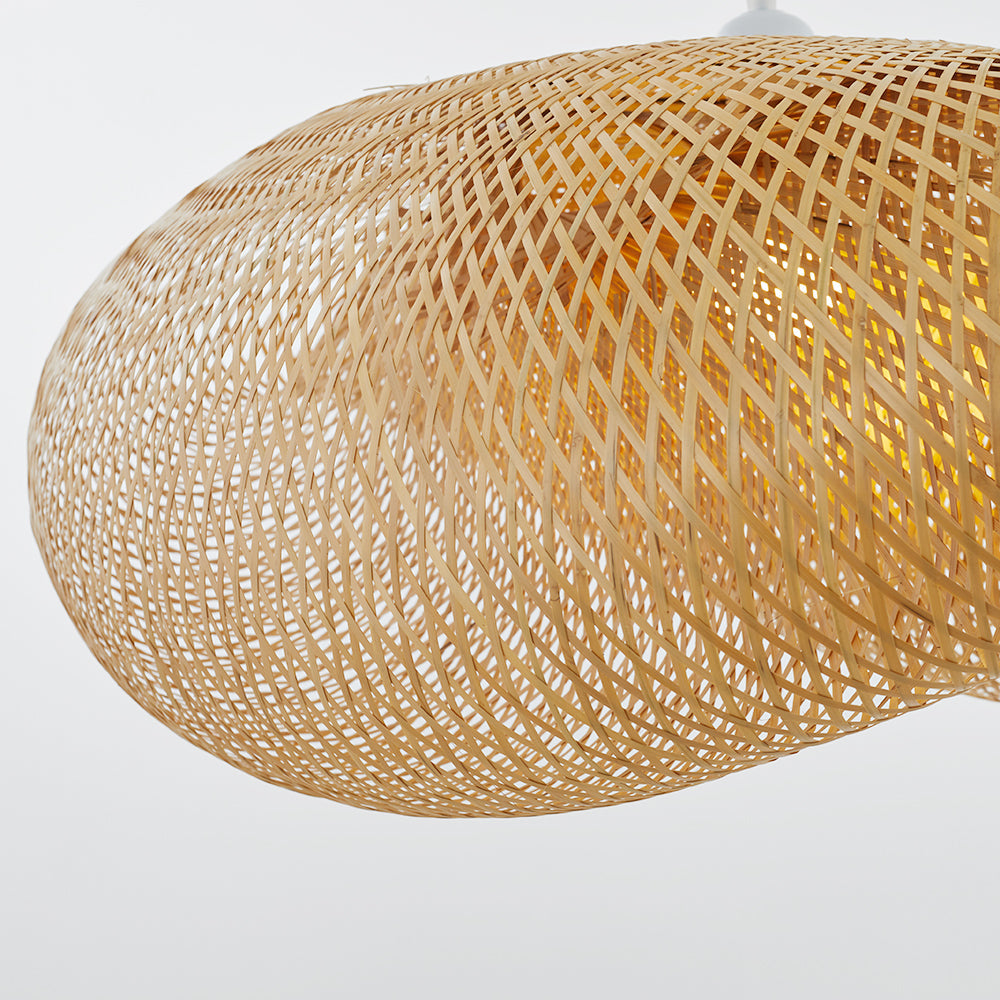 Handcrafted bamboo ceiling lamp with a unique rattan shade, ideal for modern or boho home lighting.