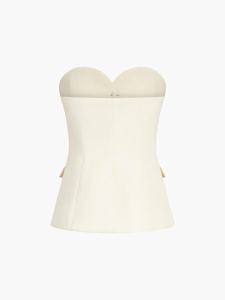 Formal wear for women: beige two piece set with corset and wide leg trousers.