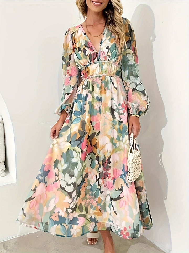 Chic long sleeve midi dress in a delicate floral pattern, perfect for parties.