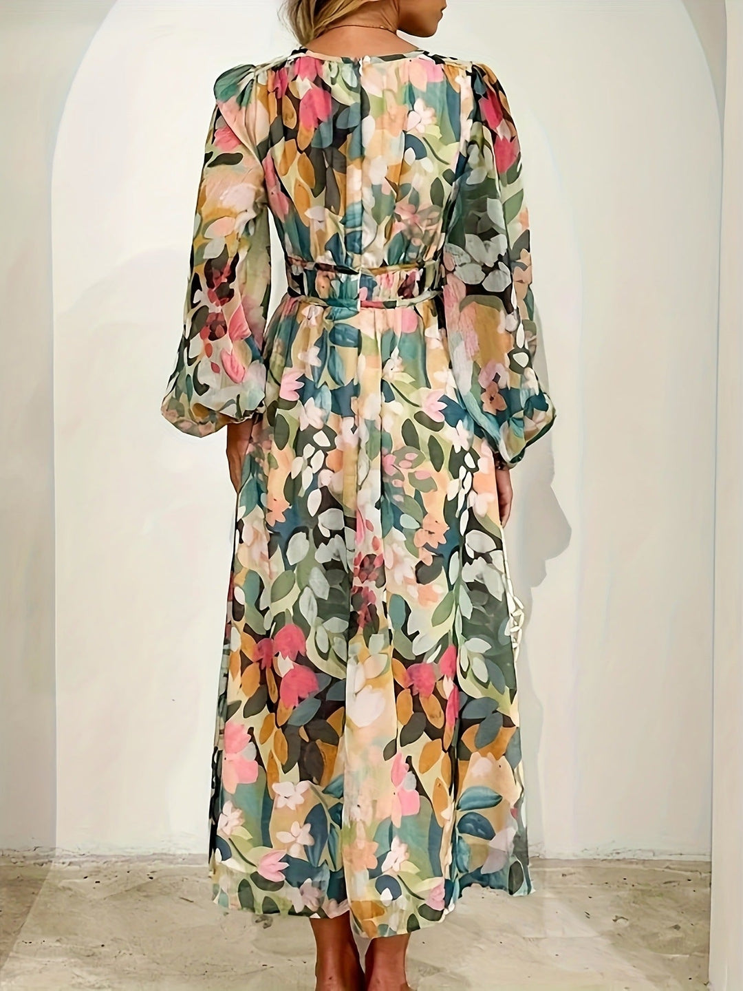 Women's floral midi dress, ideal for wedding guest attire and special occasions.