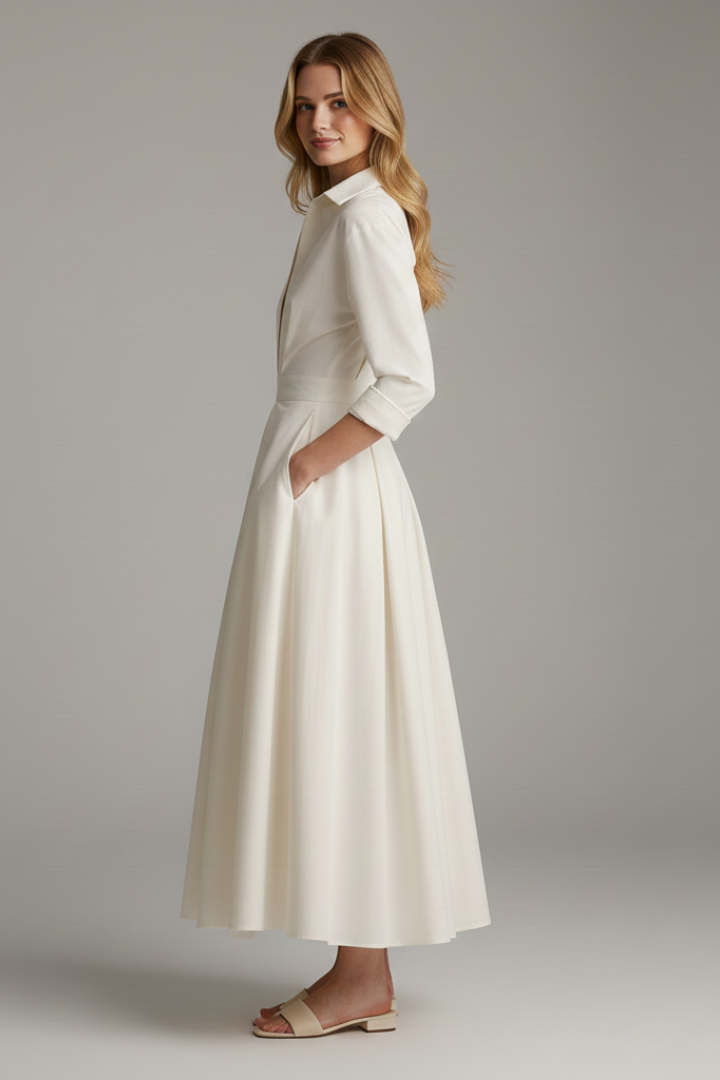 Women's elegant midi dress in black, featuring a stylish button-front design and classic collar. Great for any occasion.