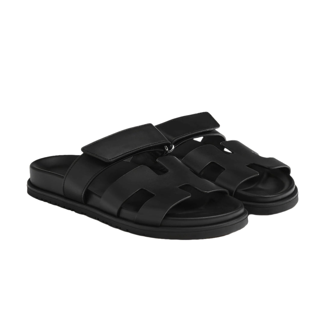 Elegant black leather strap sandals for women, chic and comfortable footwear.